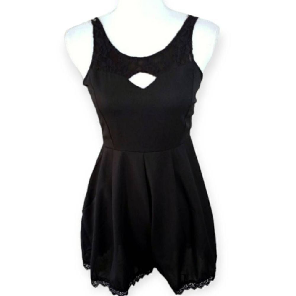 BLACK ROMPER SZ.S IN EXCELLENT USED CONDITION